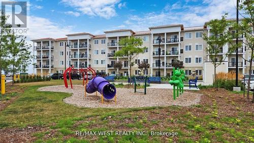 118 - 50 Lakebreeze Drive, Clarington, ON - Outdoor With Balcony With Facade