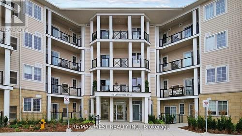 118 - 50 Lakebreeze Drive, Clarington, ON - Outdoor With Balcony With Facade