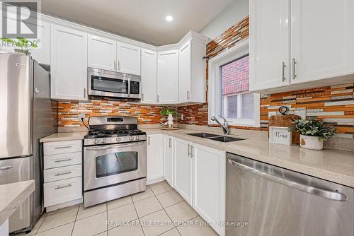 4264 Vivaldi Road E, Burlington, ON - Indoor Photo Showing Kitchen With Double Sink