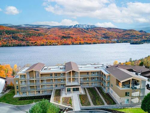 Aerial photo - 403-123 Rue Cuttle, Mont-Tremblant, QC - Outdoor With Body Of Water With Balcony