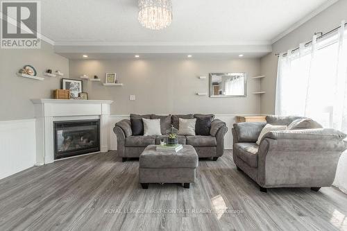 25 Truax Crescent, Essa, ON - Indoor Photo Showing Living Room With Fireplace