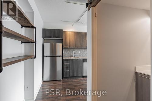 201 - 38 Joe Shuster Way, Toronto, ON - Indoor Photo Showing Kitchen