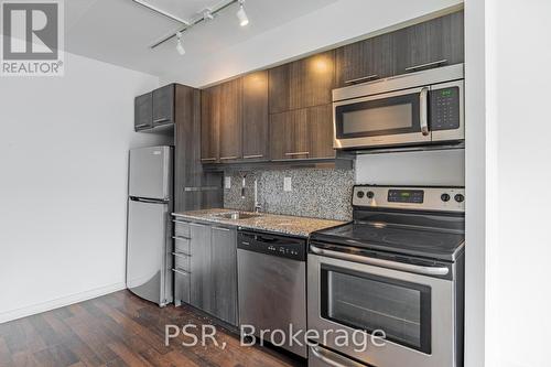 201 - 38 Joe Shuster Way, Toronto, ON - Indoor Photo Showing Kitchen