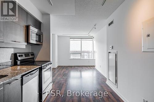 201 - 38 Joe Shuster Way, Toronto, ON - Indoor Photo Showing Kitchen