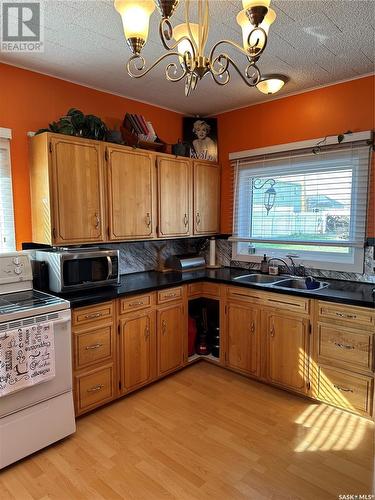 109 2Nd Street S, Cabri, SK - Indoor Photo Showing Kitchen With Double Sink