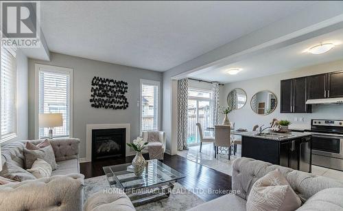 9 Humberstone Crescent, Brampton, ON - Indoor Photo Showing Living Room With Fireplace