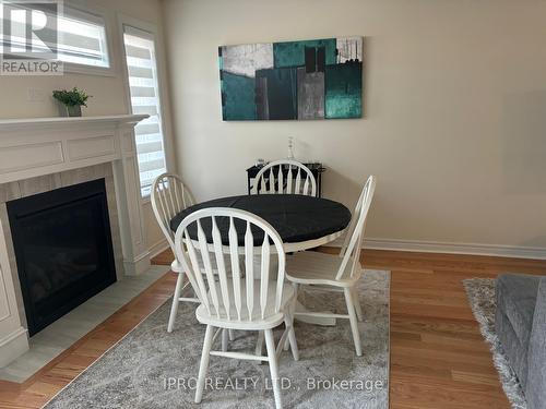 6 Jevons Drive, Ajax, ON - Indoor Photo Showing Dining Room With Fireplace