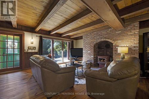 9126 Sideroad 27, Erin, ON - Indoor Photo Showing Living Room With Fireplace