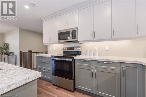 135 Ronnies Way, Mount Forest, ON - Indoor Photo Showing Kitchen With Upgraded Kitchen