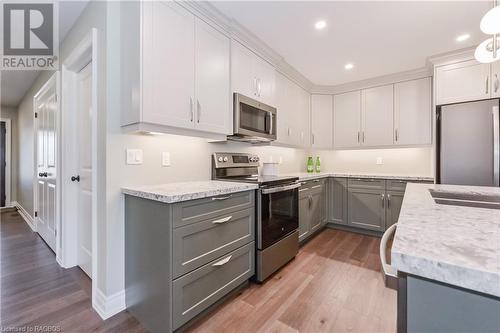 135 Ronnies Way, Mount Forest, ON - Indoor Photo Showing Kitchen With Upgraded Kitchen