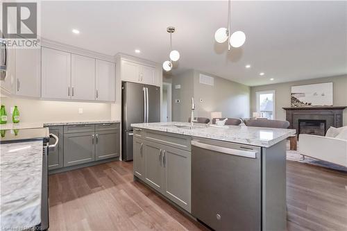 135 Ronnies Way, Mount Forest, ON - Indoor Photo Showing Kitchen With Upgraded Kitchen