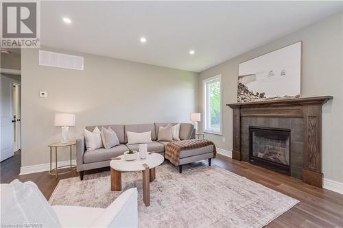 135 Ronnies Way, Mount Forest, ON - Indoor Photo Showing Living Room With Fireplace