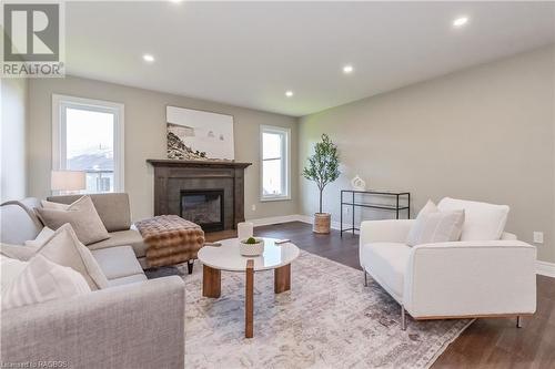 135 Ronnies Way, Mount Forest, ON - Indoor Photo Showing Living Room With Fireplace