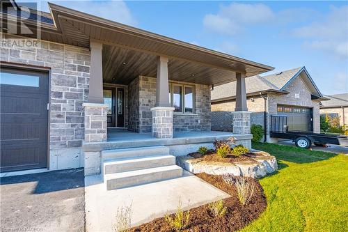 135 Ronnies Way, Mount Forest, ON - Outdoor With Deck Patio Veranda With Facade