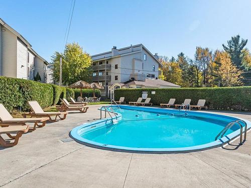 Pool - D-203-261 Rue Merry S., Magog, QC - Outdoor With In Ground Pool With Backyard