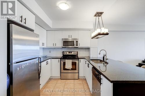 401B - 70 Baycliffe Crescent, Brampton, ON - Indoor Photo Showing Kitchen With Double Sink With Upgraded Kitchen