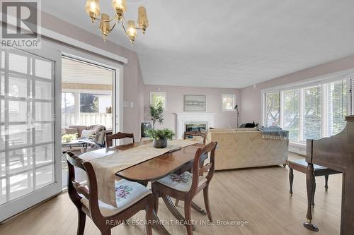 33 Brookfield Boulevard, Haldimand, ON - Indoor Photo Showing Dining Room With Fireplace