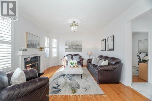 30 Latania Boulevard, Brampton, ON - Indoor Photo Showing Living Room With Fireplace