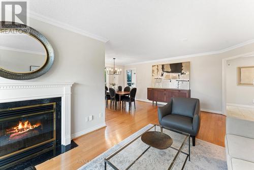 306 - 1 Ripley Avenue S, Toronto, ON - Indoor Photo Showing Living Room With Fireplace