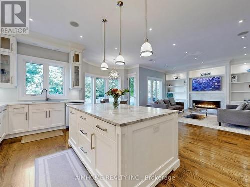 105 Ashbourne Drive, Toronto, ON - Indoor Photo Showing Kitchen With Fireplace With Upgraded Kitchen