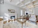 105 Ashbourne Drive, Toronto, ON  - Indoor Photo Showing Living Room With Fireplace 