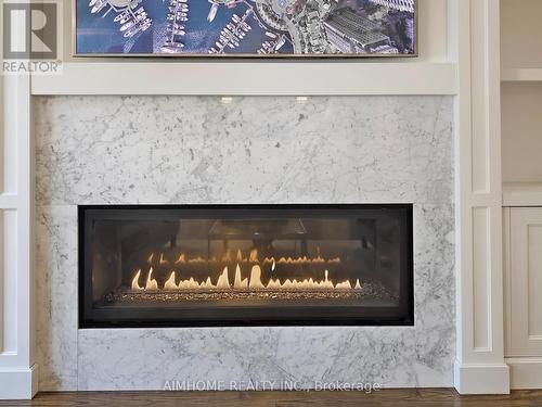 105 Ashbourne Drive, Toronto, ON - Indoor Photo Showing Living Room With Fireplace