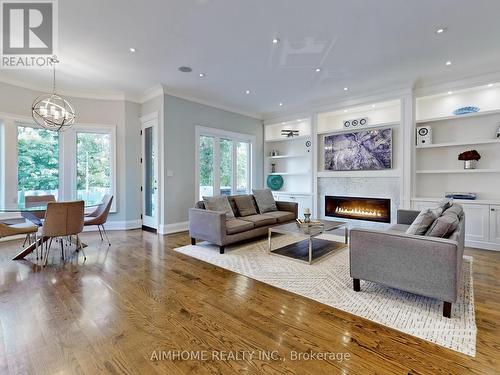 105 Ashbourne Drive, Toronto, ON - Indoor Photo Showing Living Room With Fireplace