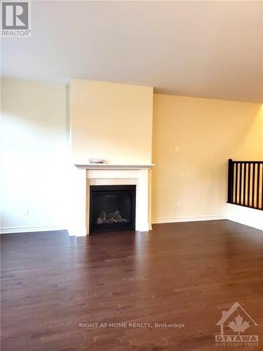 58 Mandevilla Crescent, Ottawa, ON - Indoor Photo Showing Living Room With Fireplace