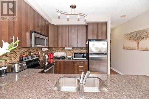 412 - 9235 Jane Street, Vaughan, ON - Indoor Photo Showing Kitchen With Double Sink With Upgraded Kitchen