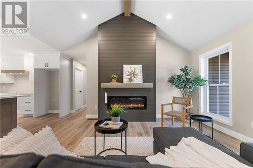 706 Royal Pines Road, Eganville, ON - Indoor Photo Showing Living Room With Fireplace