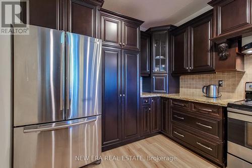 102 - 8111 Forest Glen Drive, Niagara Falls, ON - Indoor Photo Showing Kitchen With Stainless Steel Kitchen