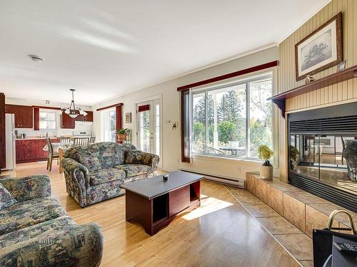 Living room - 527 Ch. Jean-Adam, Saint-Sauveur, QC - Indoor Photo Showing Living Room With Fireplace