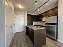 454 6758 188 Street, Surrey, BC  - Indoor Photo Showing Kitchen With Double Sink 