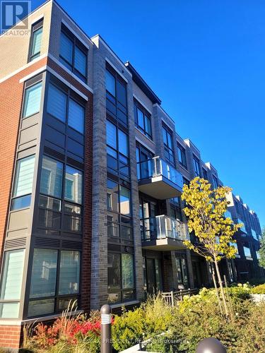 230 - 85 Attmar Drive, Brampton, ON - Outdoor With Balcony With Facade