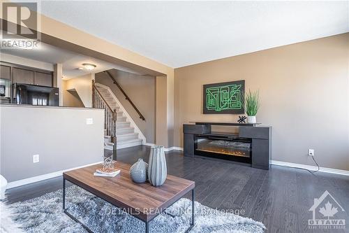 249 Keltie, Ottawa, ON - Indoor Photo Showing Living Room With Fireplace