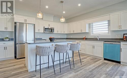 #403 131 Beaudry Crescent, Martensville, SK - Indoor Photo Showing Kitchen With Double Sink