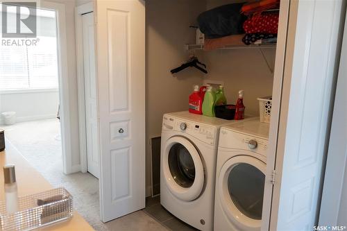 223 Newton Link, Saskatoon, SK - Indoor Photo Showing Laundry Room