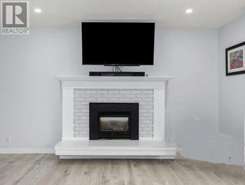 2924 Gorman Road, West Kelowna, BC - Indoor Photo Showing Living Room With Fireplace