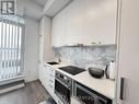 1217 - 38 Honeycrisp Crescent, Vaughan, ON  - Indoor Photo Showing Kitchen With Upgraded Kitchen 