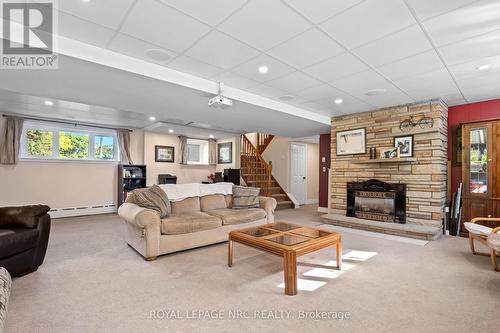 561 Kemp Road E, Grimsby, ON - Indoor Photo Showing Living Room With Fireplace