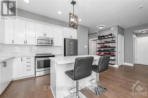 203 - 615 Longfields Drive, Ottawa, ON - Indoor Photo Showing Kitchen With Stainless Steel Kitchen With Upgraded Kitchen