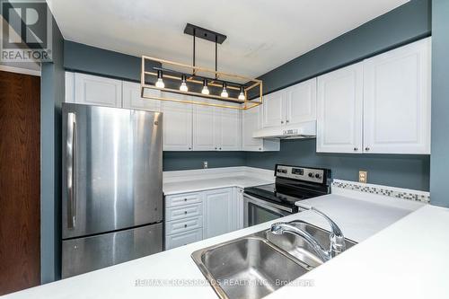 303 - 18 Pemberton Avenue, Toronto, ON - Indoor Photo Showing Kitchen With Double Sink