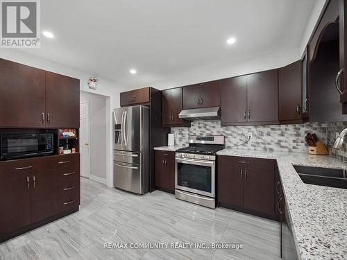 106 Charles Brown Road, Markham, ON - Indoor Photo Showing Kitchen With Double Sink