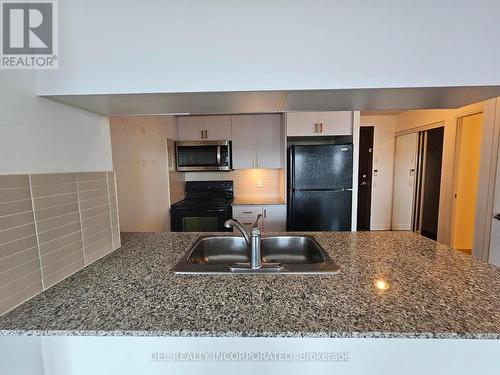 2448 - 25 Viking Lane, Toronto, ON - Indoor Photo Showing Kitchen With Double Sink