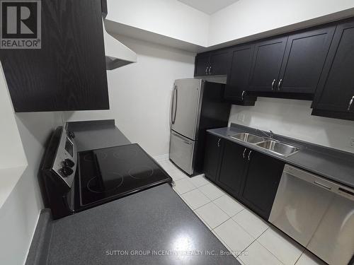 205 - 100 Dean Avenue, Barrie, ON - Indoor Photo Showing Kitchen With Double Sink