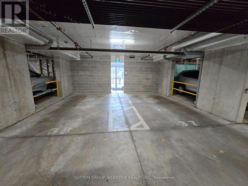 205 - 100 Dean Avenue, Barrie, ON - Indoor Photo Showing Garage