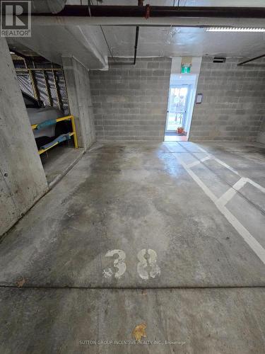 205 - 100 Dean Avenue, Barrie, ON - Indoor Photo Showing Garage