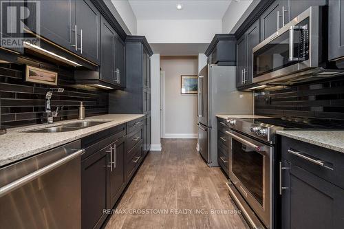 202 - 720 Yonge Street, Barrie, ON - Indoor Photo Showing Kitchen With Double Sink With Upgraded Kitchen