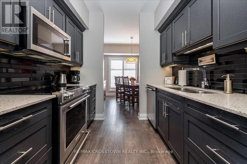 202 - 720 Yonge Street, Barrie, ON - Indoor Photo Showing Kitchen With Double Sink