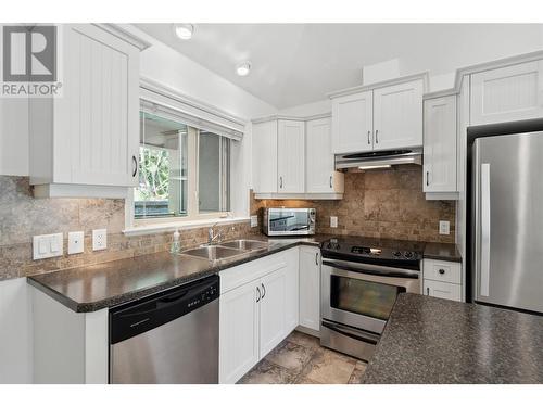 4433 Gordon Drive Unit# 208, Kelowna, BC - Indoor Photo Showing Kitchen With Double Sink